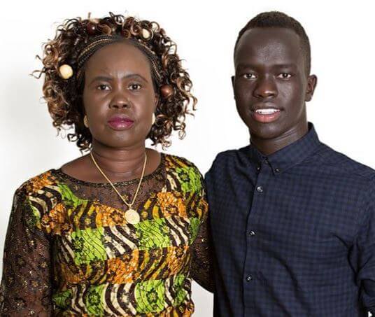 Awer Mabil with his mother.